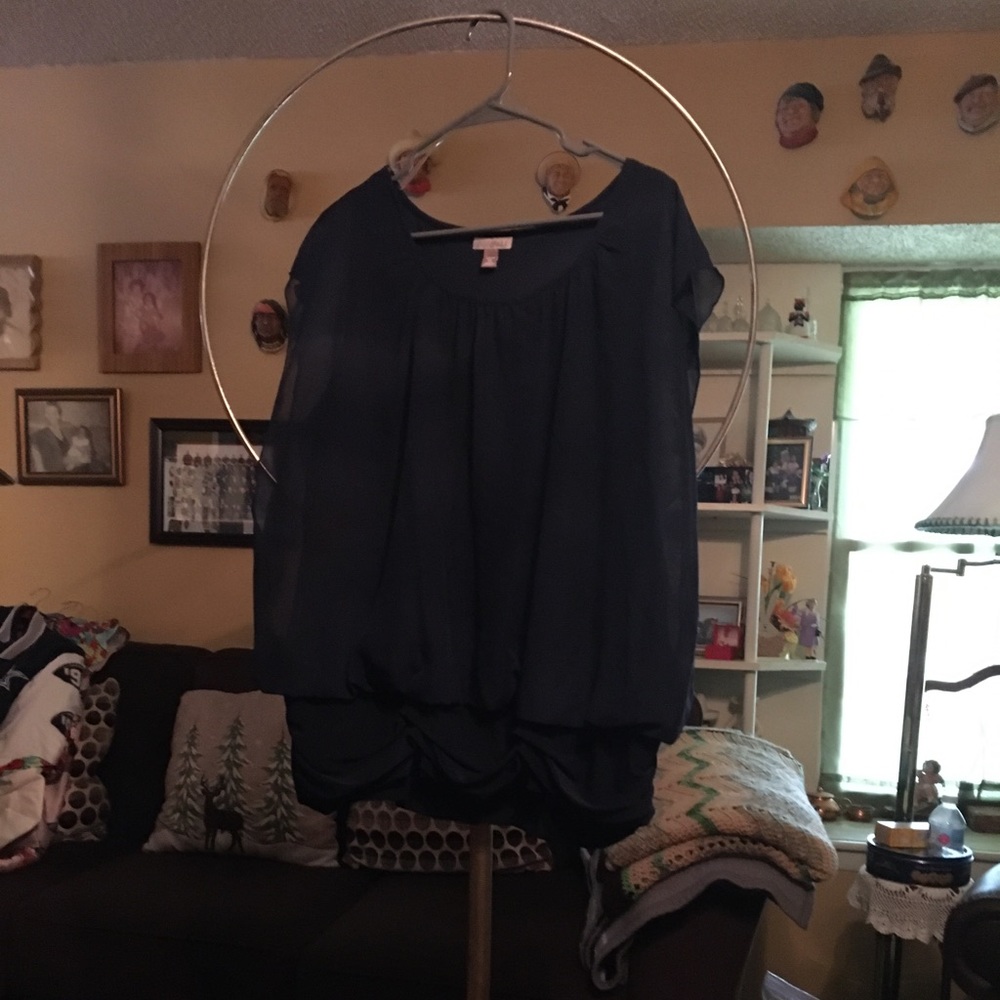 Black top gathered at waist